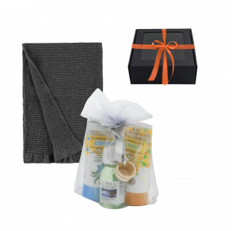 Cadeauset voor mannen in een geschenkverpakking. Saunahoning, saunaolie en handdoek.