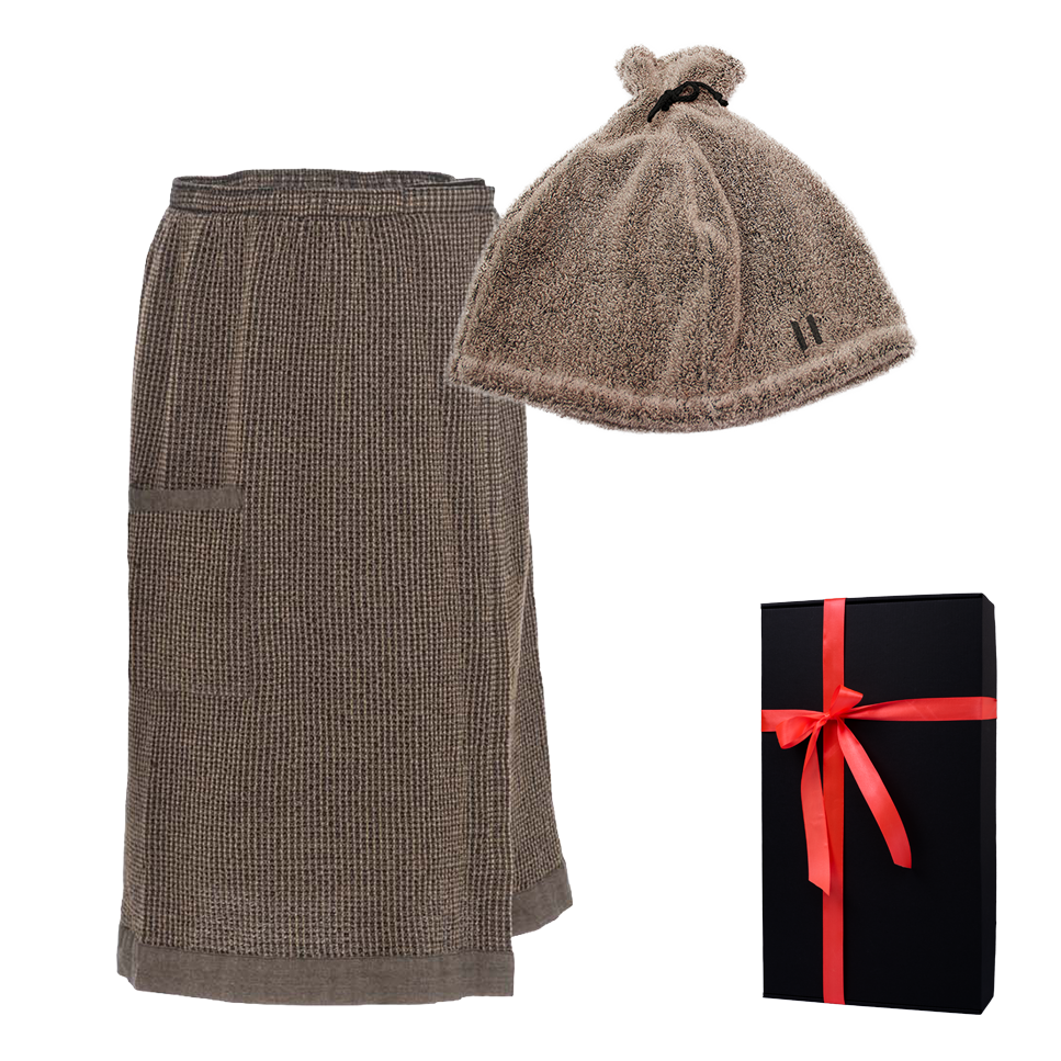 Saunaschort en -muts in een geschenkdoos